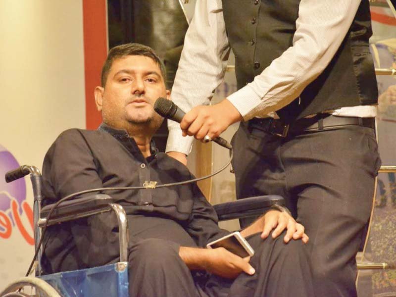 Wheelchair-bound activist Yasir Khan. PHOTO: EXPRESS