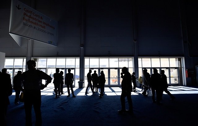 Attendees stand around after the power went out during CES 2018 inside the central hall at the Las Vegas Convention Center on January 10, 2018 in Las Vegas, Nevada.
PHOTO: AFP