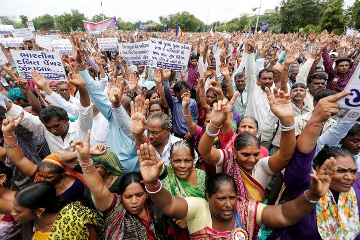 People shout slogans as they attend a protest rally against what they say are attacks on India's low-caste Dalit community in Ahmedabad,PHOTO: REUTERS