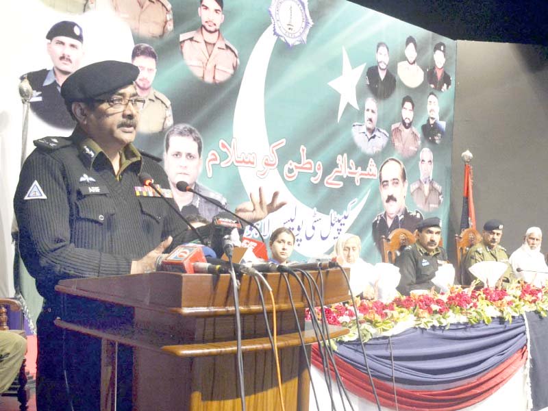 Inspector General of Police Arif Nawaz Khan addresses the Police Martyrs Day (Youm-e-Shuhada) ceremony. PHOTO: ONLINE