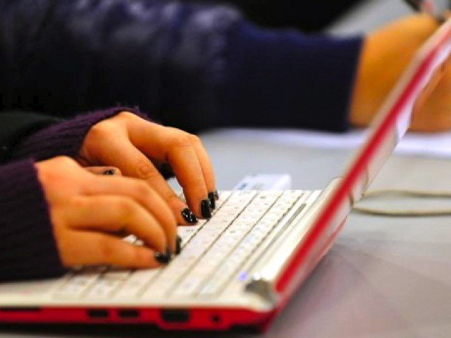 3,215 laptops distributed among students PHOTO: REUTERS