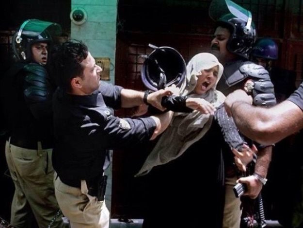 A file photo of the Model Town clashes between police and PAT activists in 2014.