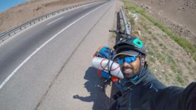 Francis has managed to travel the cheapest way possible, Bicycle. PHOTO COURTESY: www.bbc.com