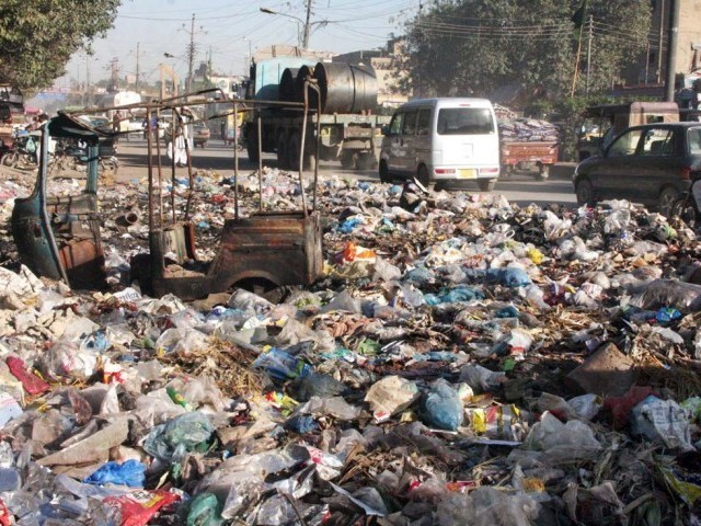 Disposal of solid waste in Karachi is one of the city's major issues that continues unresolved. PHOTO: ONLINE/FILE
