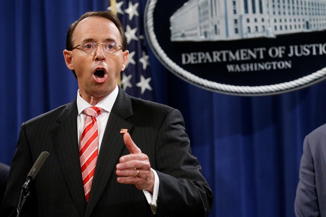 Deputy U.S. Attorney General Rod Rosenstein announces grand jury indictments of 12 Russian intelligence officers in special counsel Robert Mueller's Russia investigation during a news conference at the Justice Department in Washington, US, July 13, 2018. PHOTO: REUTERS