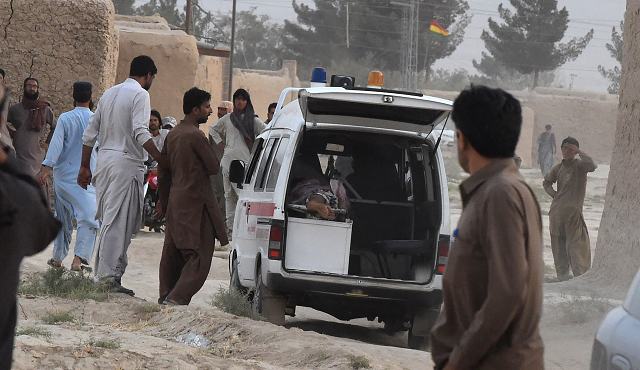 Emergency workers shuttled victims to nearby vehicles from the bombed-out compound as bystanders sobbed in the darkness owing to the waning electricity in the impoverished area.


PHOTO:AFP