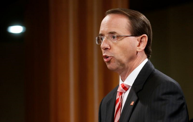 Deputy U.S. Attorney General Rod Rosenstein announces grand jury indictments of 12 Russian intelligence officers in special counsel Robert Mueller's Russia investigation during a news conference at the Justice Department in Washington, U.S., July 13, 2018. PHOTO: REUTERS