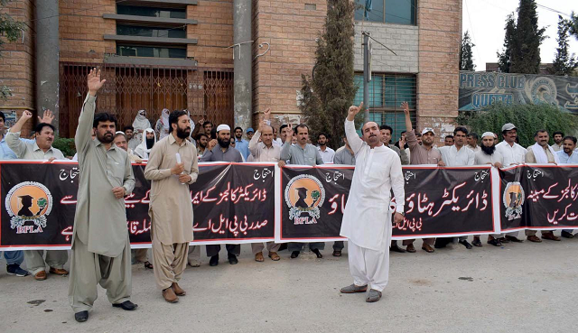 Balochistan Professors and Lecturers Association (BPLA) protesters chanting slogans outside the Quetta Press Club. PHOTO: EXPRESS