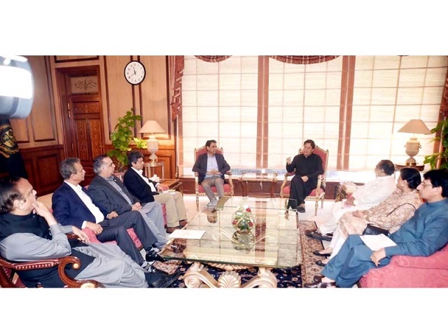 Imran guarantees implementing Karachi plan. PHOTO: PPI