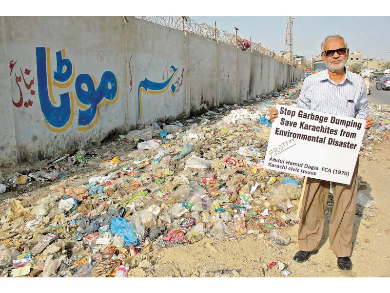 The 74-year-old Abdul Hamid Dagia, a professional accountant, has taken it upon himself to create awareness about the civic issues especially lack of cleanliness and the deteriorating sewerage system that has made living in Karachi a health hazard. PHOTO: ATHAR KHAN/EXPRESS