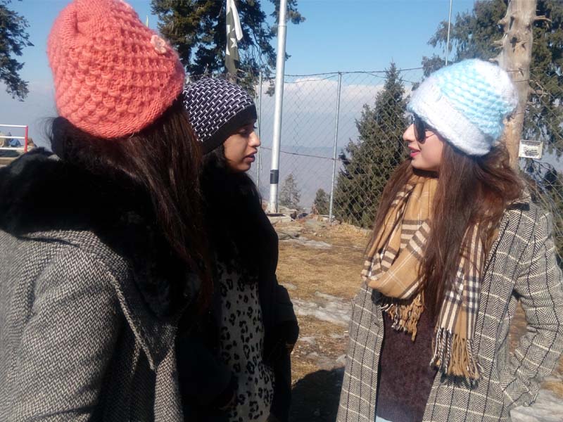 Girls chat during Malam Jabba festival. PHOTO: EXPRESS