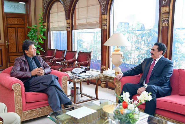 Former army chief calls on PM Imran Khan at PM House. PHOTO: PID
