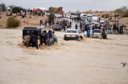 Motorists face inconvenience because of flood in C-Avenue area of Quetta. PHOTO: ONLINE