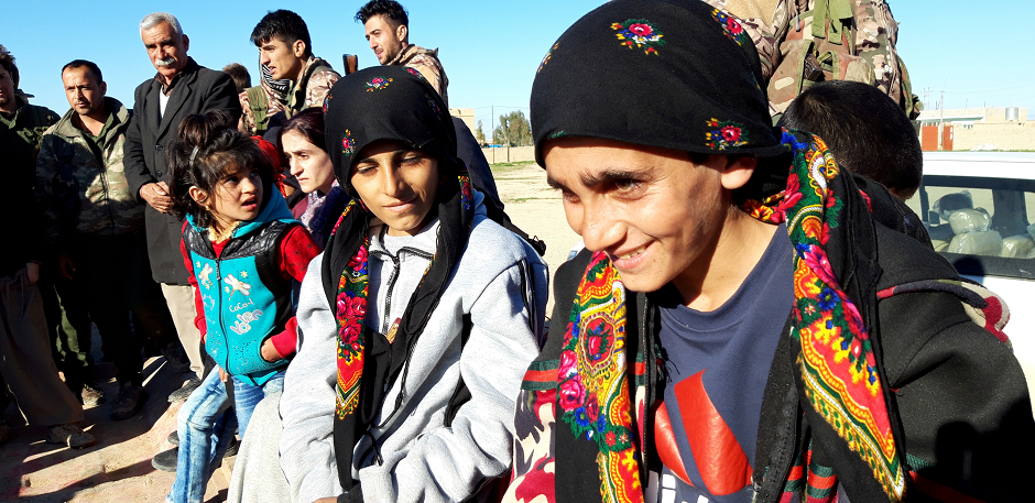 Yazidi children survivors are greeted by residents of Sinuni following their release from Islamic State militants in Syria, in Sinuni, Iraq March 1, 2019. PHOTO: REUTERS