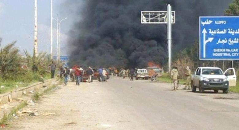 Still image shows a cloud of black smoke rising from vehicles in the distance in what is said to be Aleppo's outskirts, Syria April 15, 2017. PHOTO: REUTERS
