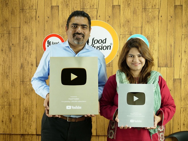 Asad Memon and Saima Asad, the pioneers of Food Fusion pose with their recent awards from YouTube.
PHOTO: FOOD FUSION