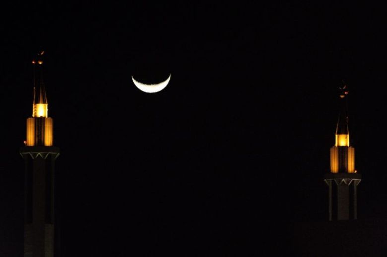 The sighting of the new moon in Ramadan, the ninth month of the Islamic calendar, signals the start of fasting. PHOTO: AFP