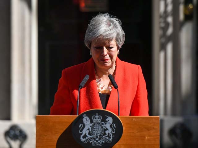 Theresa May reacts as she delivers a speech announcing her resignation. PHOTO: GETTY