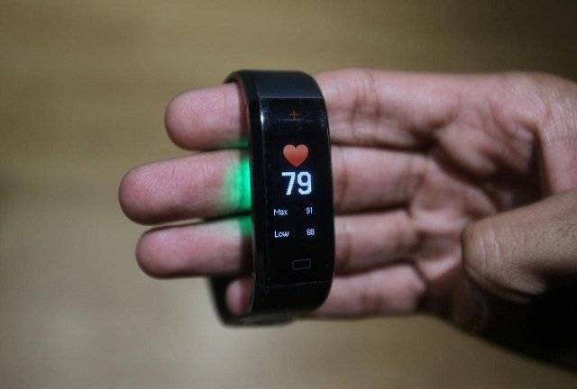 An employee displays the GOQii Vital activity tracker at their office in Mumbai, India, June 3, 2019. Picture taken on June 3, 2019. PHOTO: REUTERS
