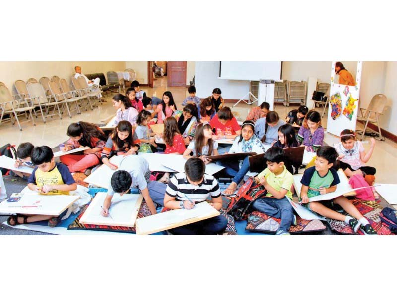 Students draw during a summer art camp. PHOTO: EXPRESS