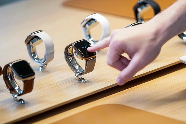 A customer checks Apple watches at the grand opening of the new Apple Carnegie Library store in Washington, US, May 11, 2019.
PHOTO: REUTERS