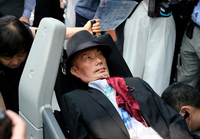 Japanese lawmaker Yasuhiko Funago's election has highlighted the fact Japan only pays for care if the disabled person is not working. PHOTO: AFP