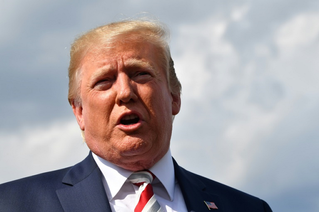 US President Donald Trump said 'hate has no place in our country' but also blamed mental illness for the violence, while critics say his custom of speaking in derogatory terms about immigrants encourages white supremacist thinking. PHOTO: AFP