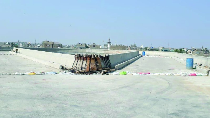 Though the construction work on the Orange Line BRTS is near completion, citizens may have to wait another year for the buses to start running due to the Sindh government’s indecision regarding the procurement of the vehicles. Photo: Express