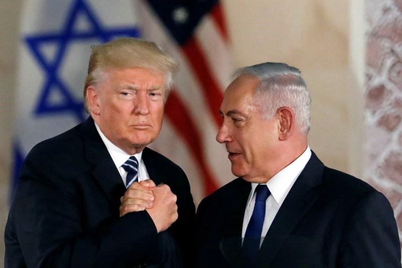US President Donald Trump and Israeli Prime Minister Benjamin Netanyahu shake hands after Trump's address at the Israel Museum in Jerusalem. PHOTO: REUTERS/FILE