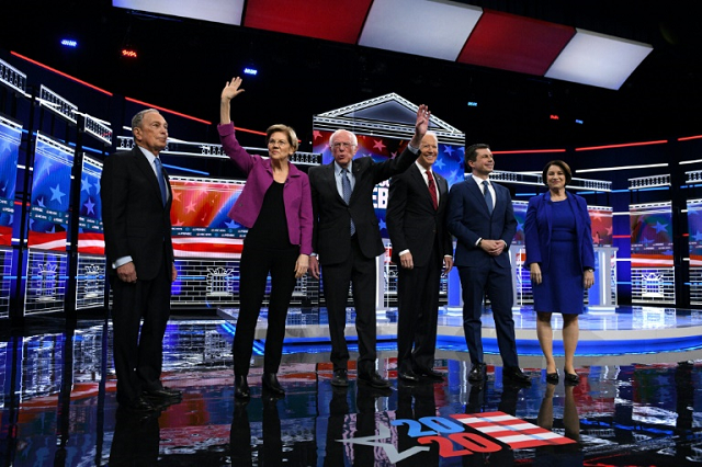 US presidential hopeful Mike Bloomberg (L), the former mayor of New York, joined his fellow Democrats on stage for the first time for their ninth debate of the party's nomination process on February 19, 2020. PHOTO: AFP