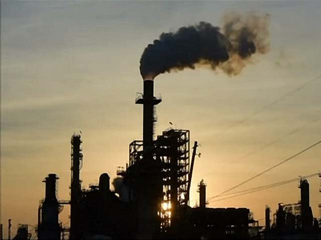 Smoke rises from the Lyondell Basell-Houston Refining plant. PHOTO: AFP