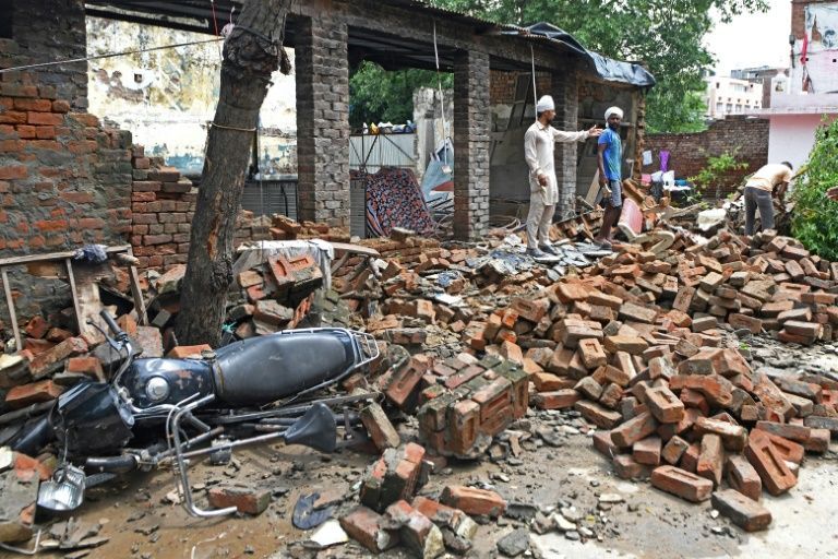In India's poorest state Bihar, home to 125 million people, 11 have died and at least four million have been affected by heavy rains, with homes and villages damaged. PHOTO: AFP