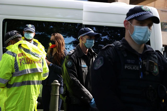 Australian police arrest six at Black Lives Matter rally for breaching virus ban