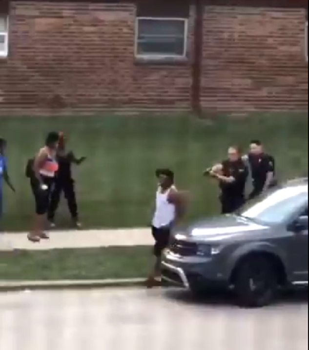 Video circulating on social media showed a man walking towards a car followed by two officers and one of them shooting him as he opens the car door. SCREENGRAB