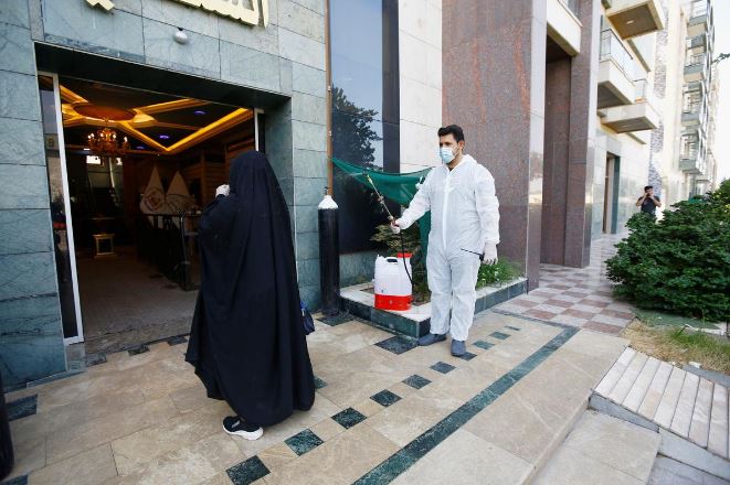 In the holy shi’ite city of Najaf where cleric Grand Ayatollah Ali al-Sistani is based, his social care foundation is helping out. PHOTO: REUTERS