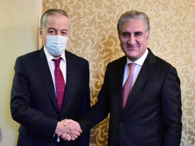 Foreign Minister Makhdoom Shah Mehmood Qureshi shaking hand with his Tajik counterpart Sirojiddin Muhriddin before a meeting at Moscow on September 09, 2020. PHOTO: PID