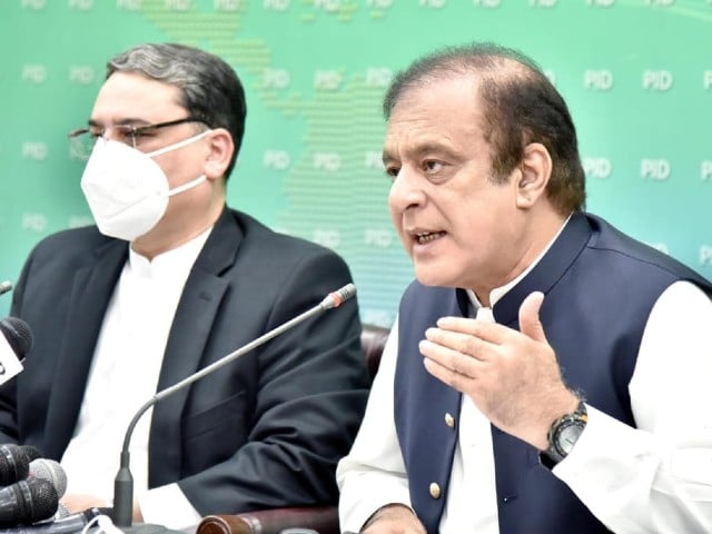 Minister for Information and Broadcasting Shibli Faraz and Naya Pakistan Housing Authority Chairman Lieutenant General (retd) Anwar Ali Hyder addressing a press conference in Islamabad. PHOTO: PID
