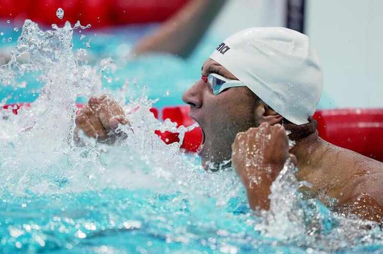 Tunisia’s Hafnaoui hopes surprise 400 freestyle gold makes family proud