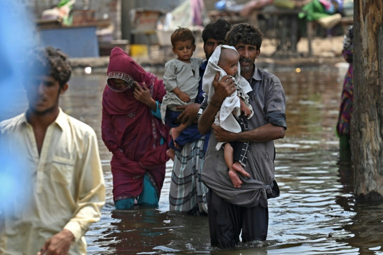 ‘A matter of honour’: Women forced to stay in flooded village