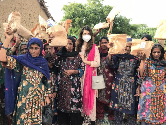 Delivering sanitary kits to flood-hit women