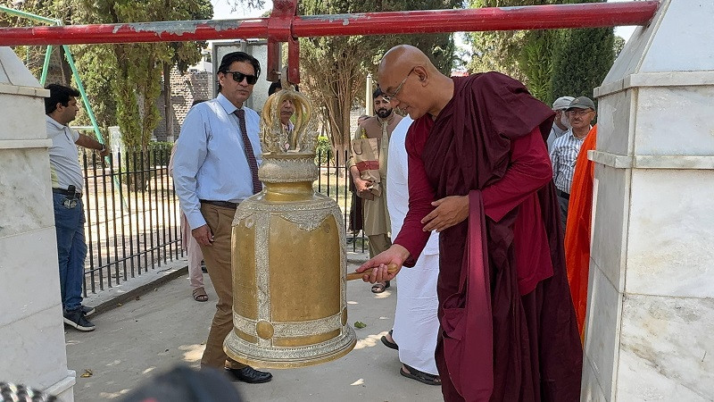 Monks ring ‘peace bell’ to mark Buddha’s birthday