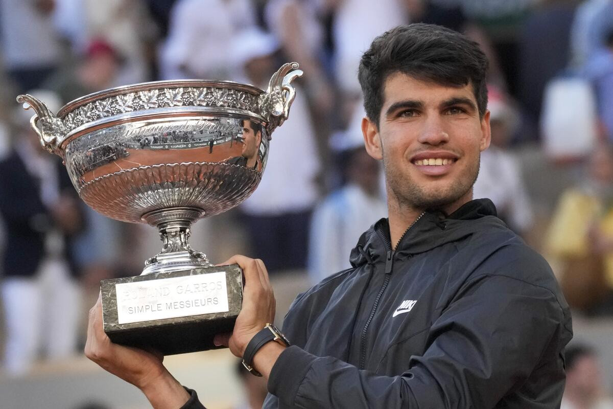 Alcaraz plays down chasing ‘impossible’ Nadal, Djokovic records